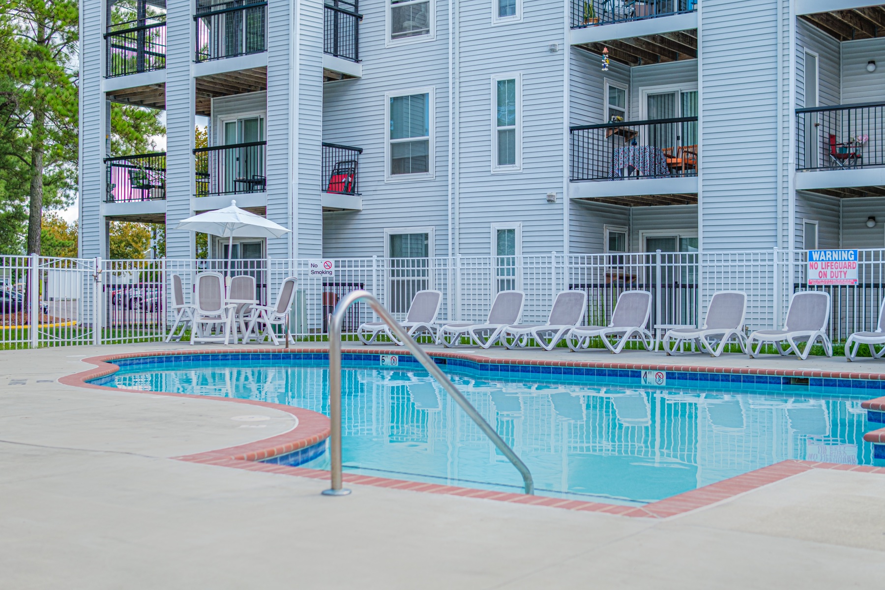 Pool and apartment community at Legends at the Beach in Virginia Beach